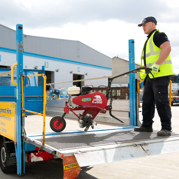 Rotovator being loaded onto a trailer